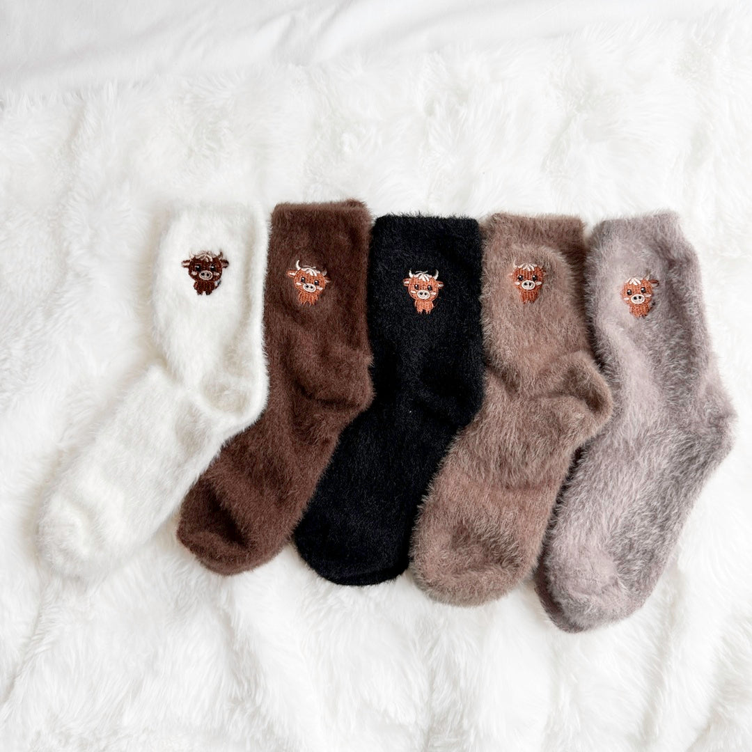 Plush crew socks pack for women in brown, black, white, and gray tones
