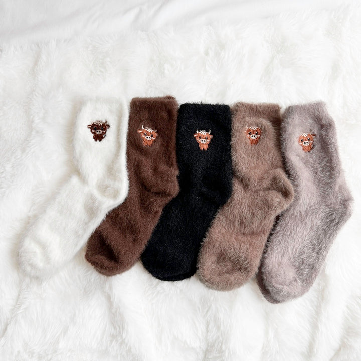 Plush crew socks pack for women in brown, black, white, and gray tones