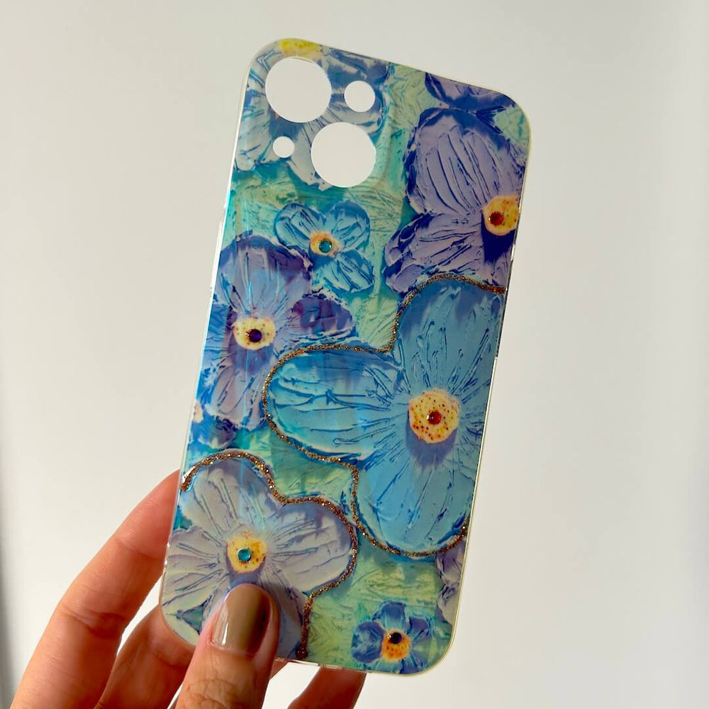 Phone case with blue floral design