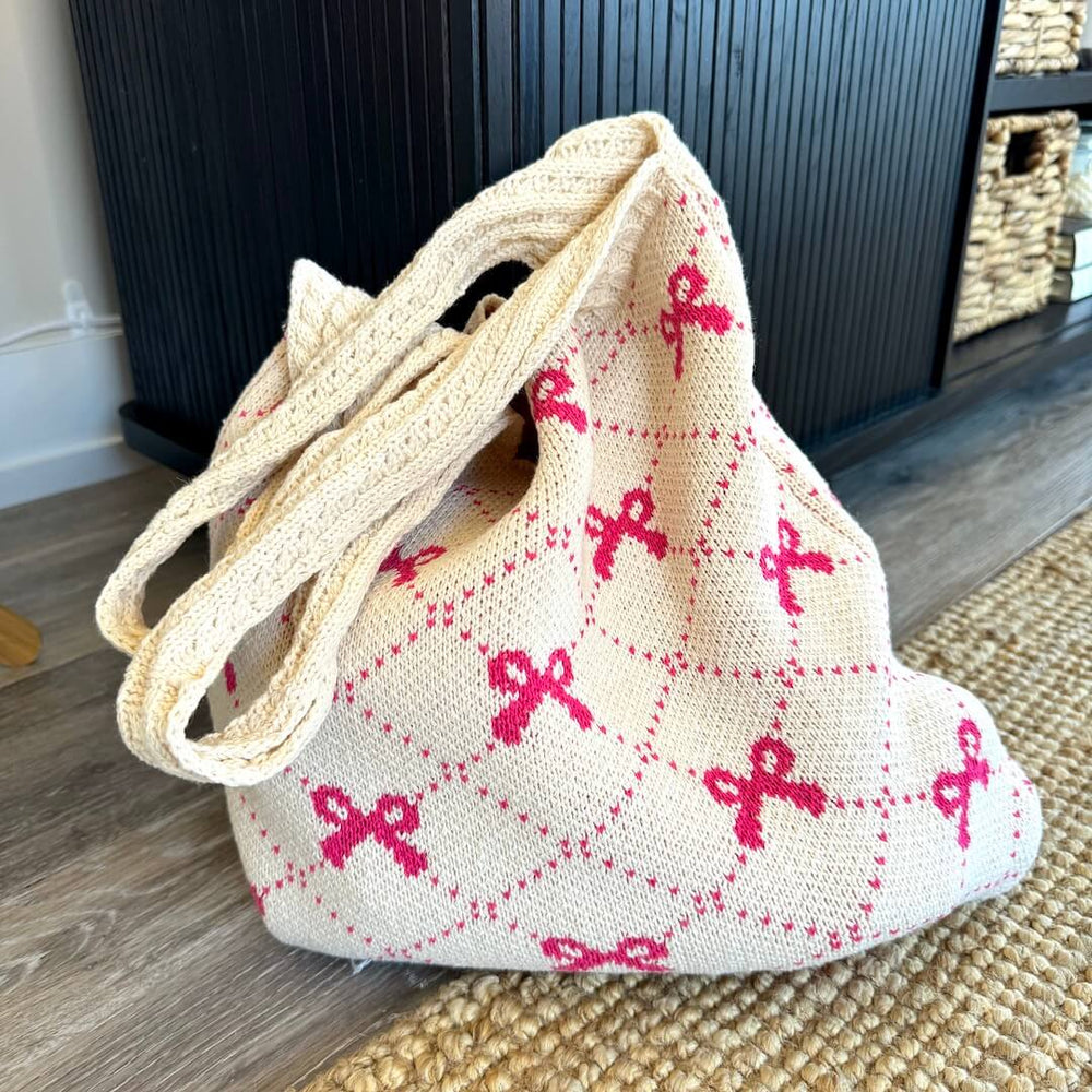 Cream tote bag with pink ribbon pattern