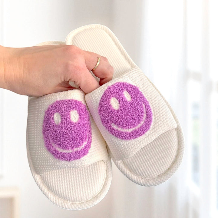 purple happy face slippers
