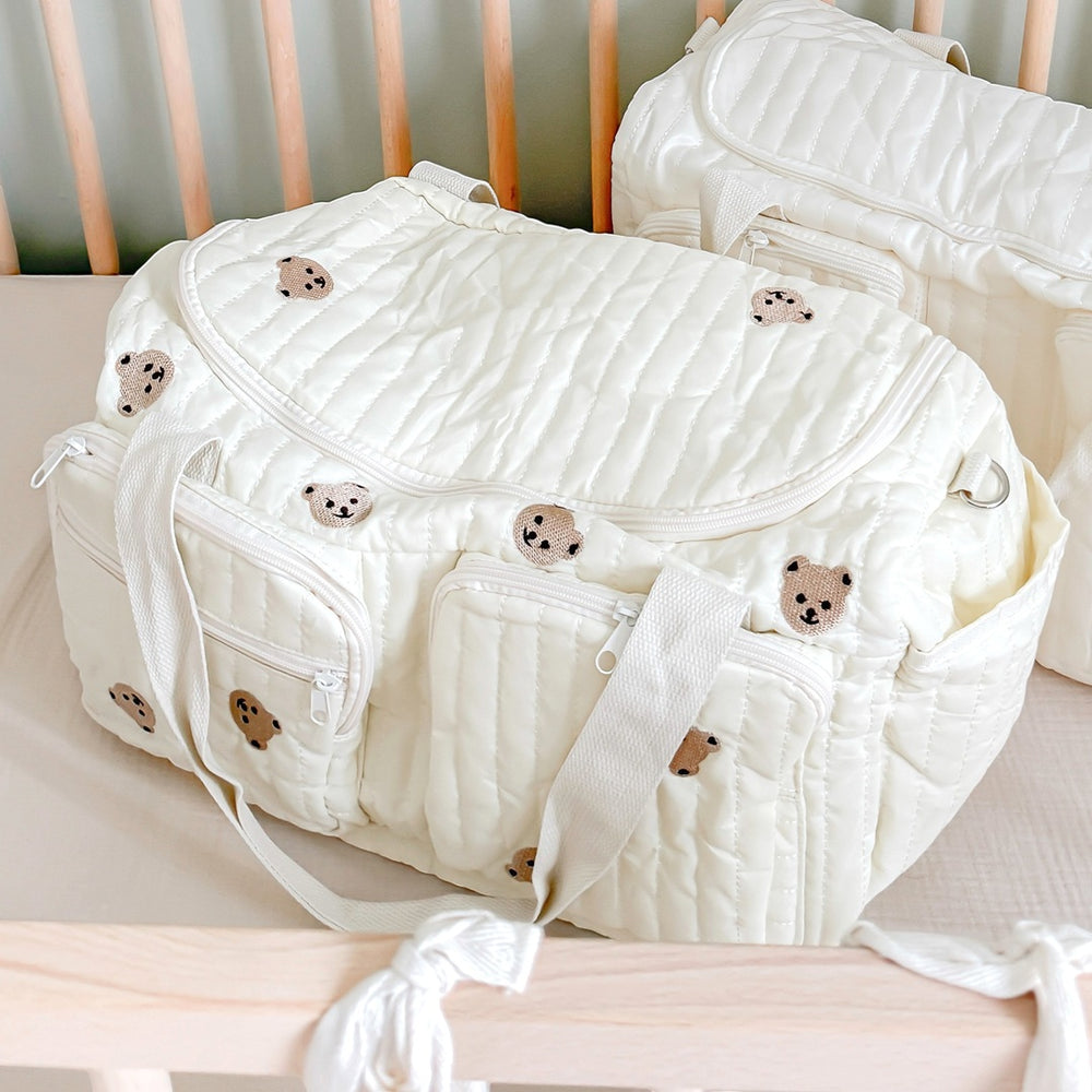 quilted diaper tote bag with embroidered teddy bear design