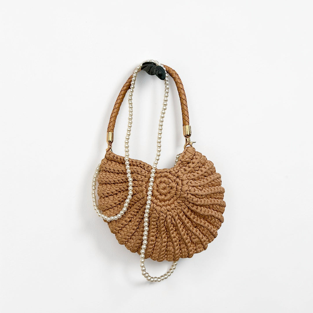 shell handbag with woven body and pearl chain strap
