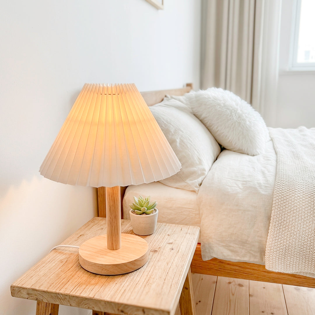 Scandinavian-style pleated bedside lamp with wood base