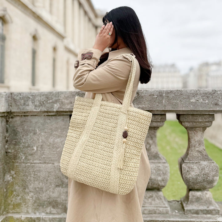 beige woven tote handbag