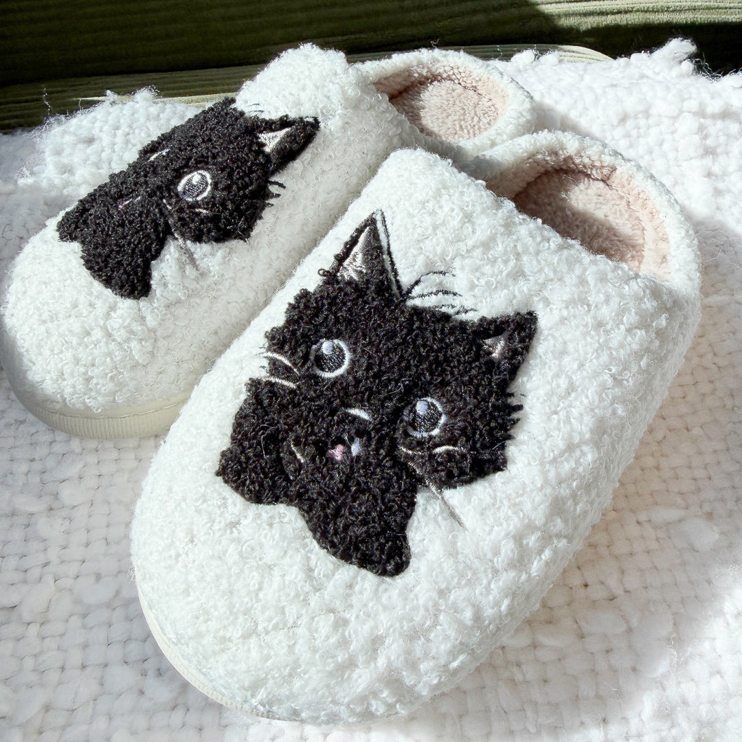 Soft indoor slippers with playful black kitten face details