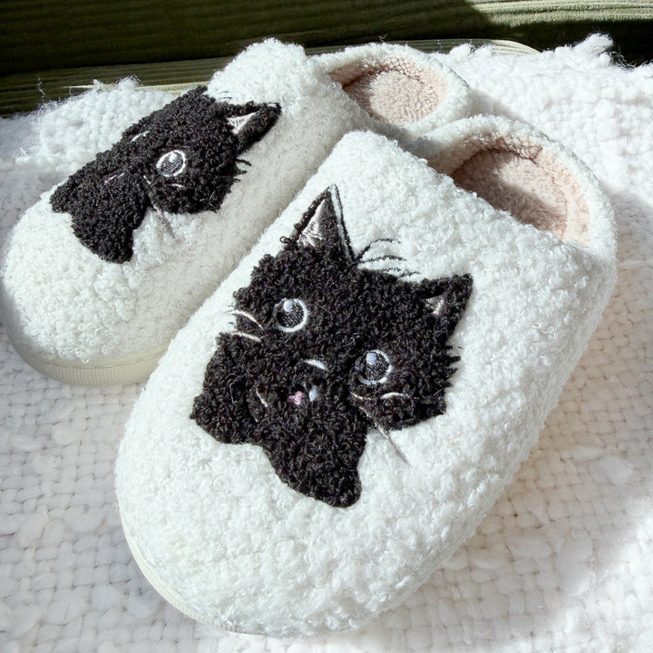 Soft indoor slippers with playful black kitten face details