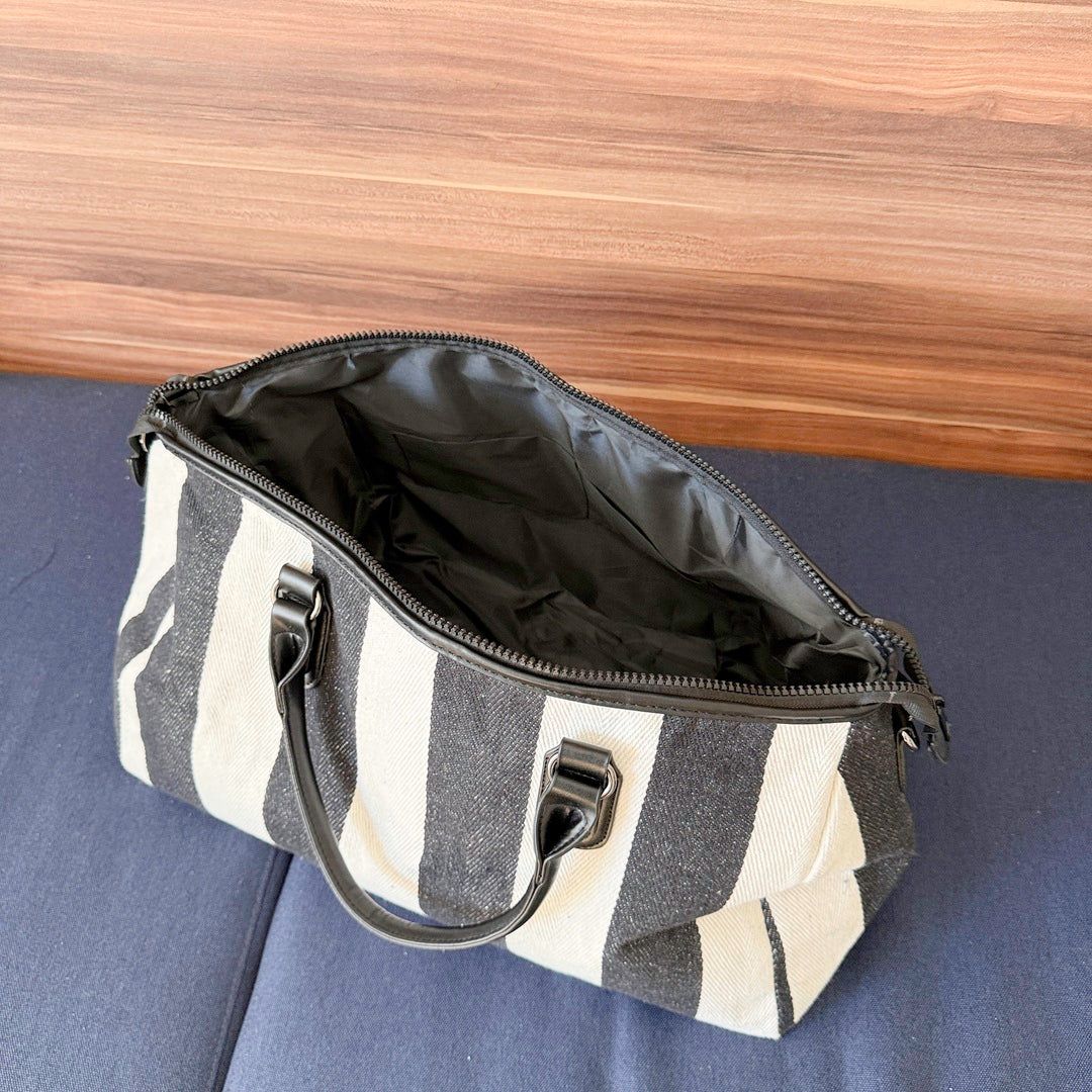 Stylish striped weekend bag for travel and gym