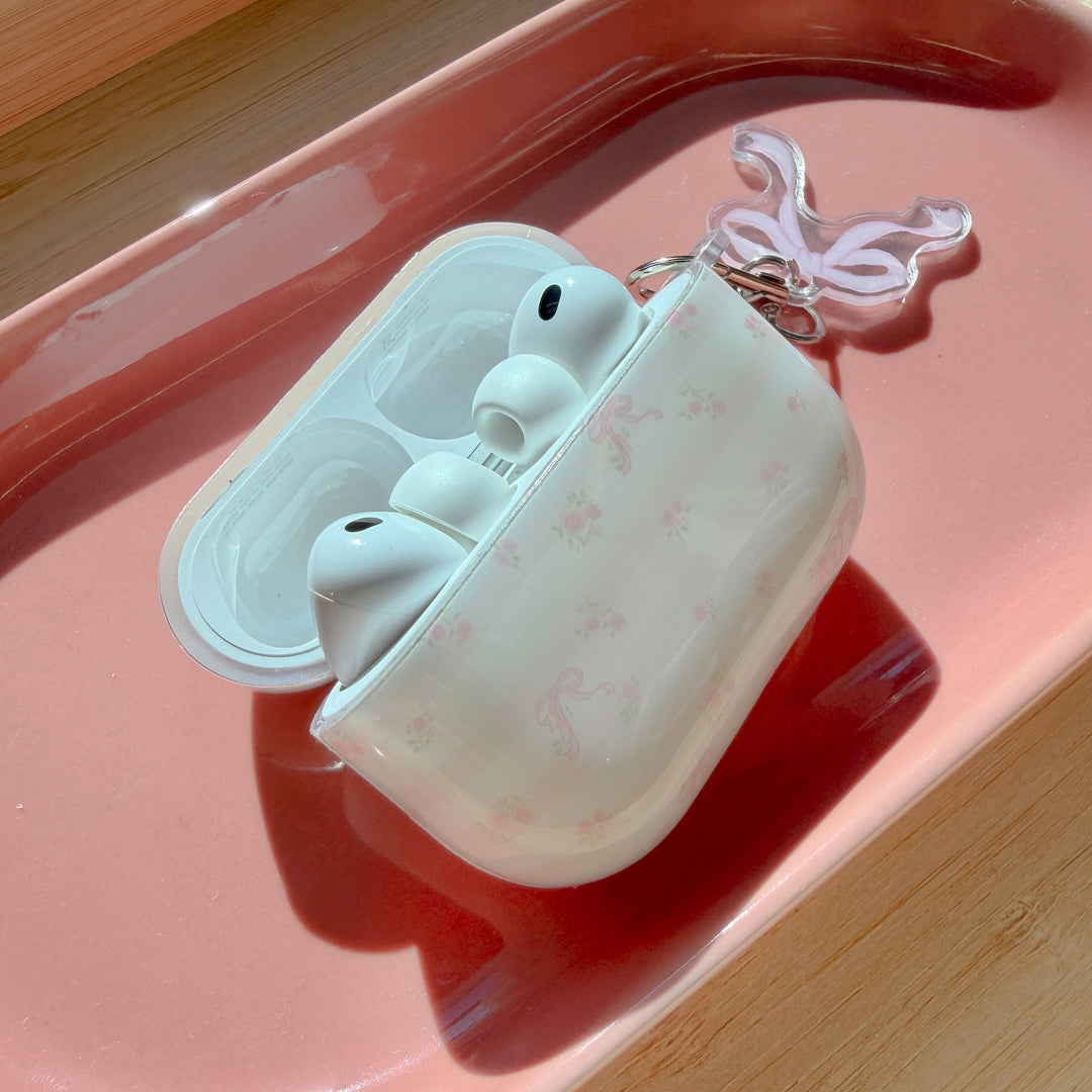 AirPods case with delicate pink bows and tiny flowers
