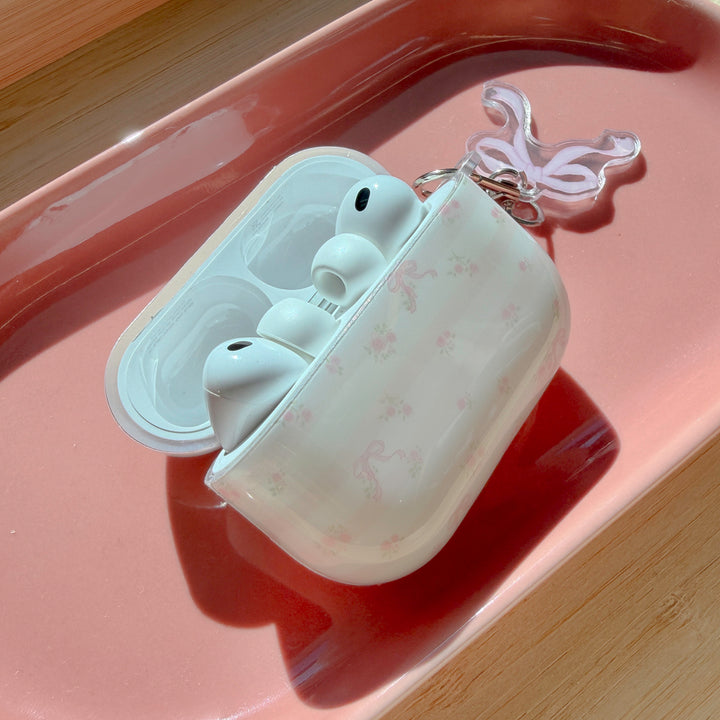 AirPods case with delicate pink bows and tiny flowers