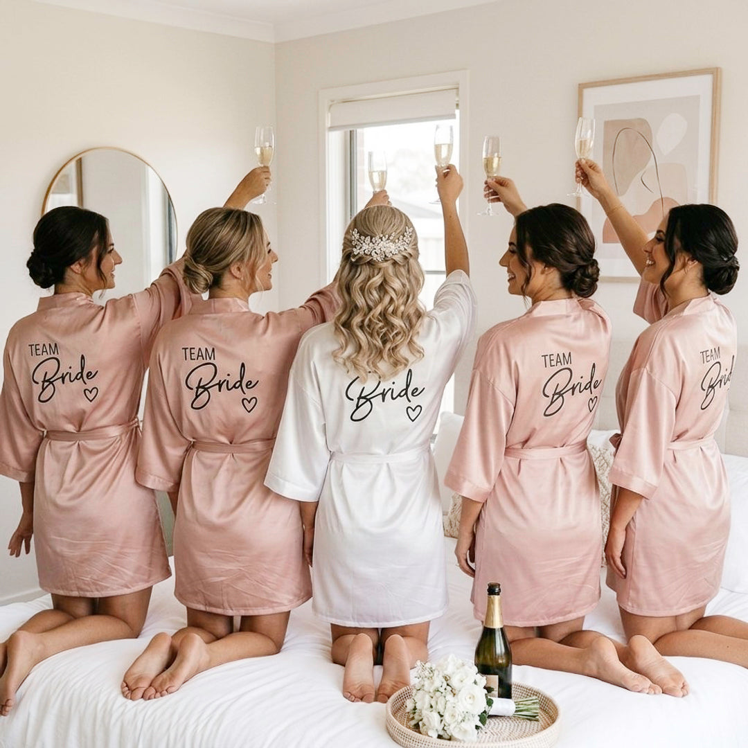 Blush satin bridesmaid robes with white bridal robe