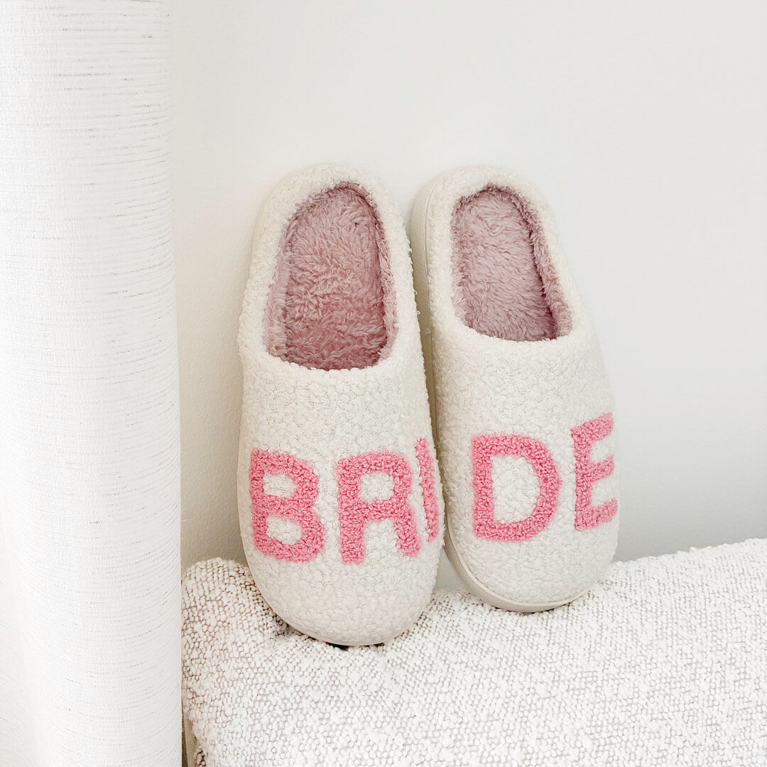 White indoor slippers with pink bride text for women