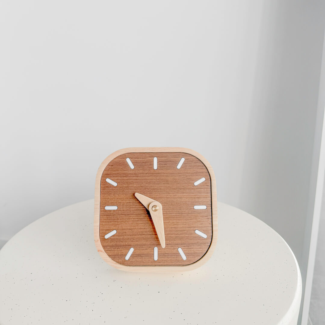 Compact wooden table clock with neutral design