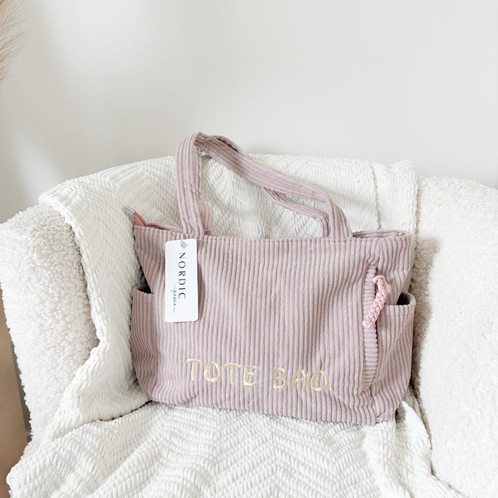 ribbed tote bag with roomy carryall design