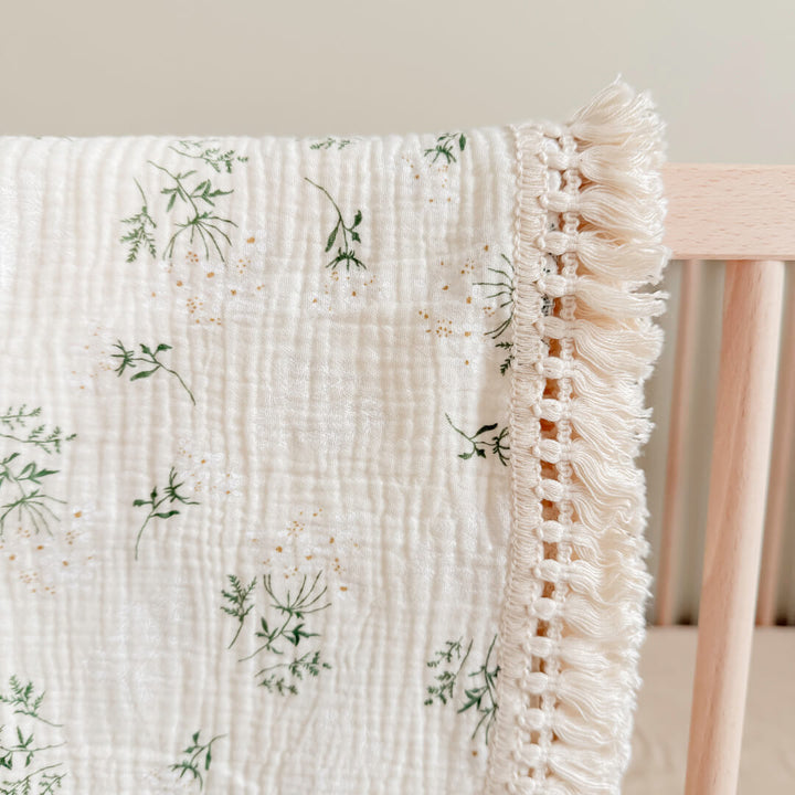 Cozy cotton baby blanket with floral print