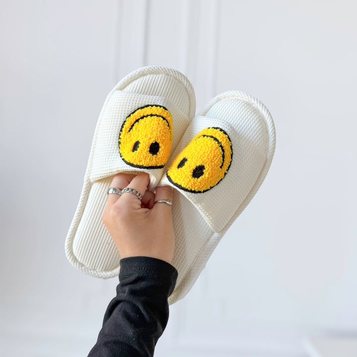 yellow happy face slippers