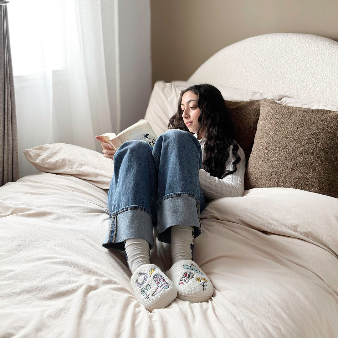 Fleece lined house shoes with playful western charm design