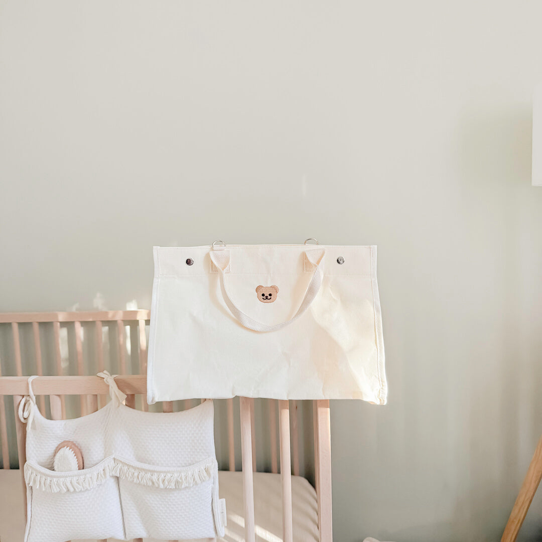 Minimalist canvas tote with small bear face patch