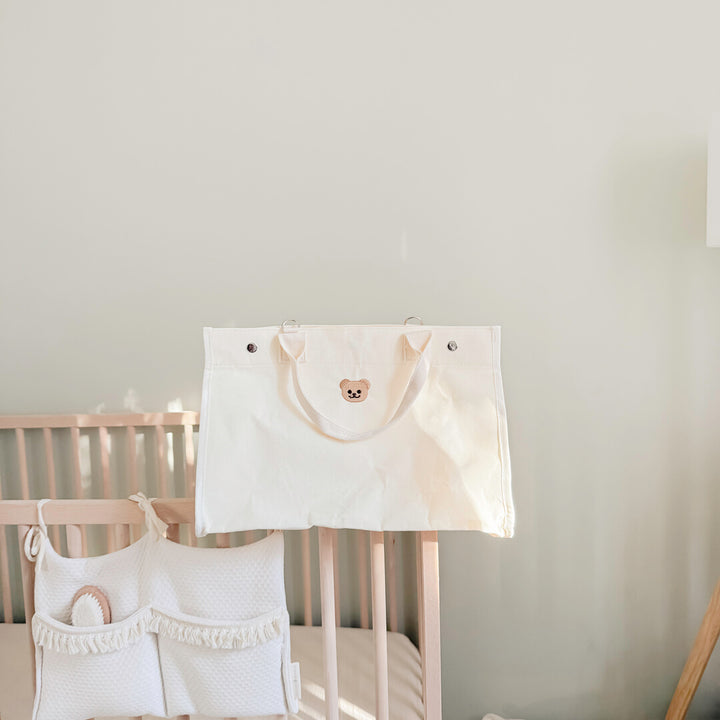 Minimalist canvas tote with small bear face patch