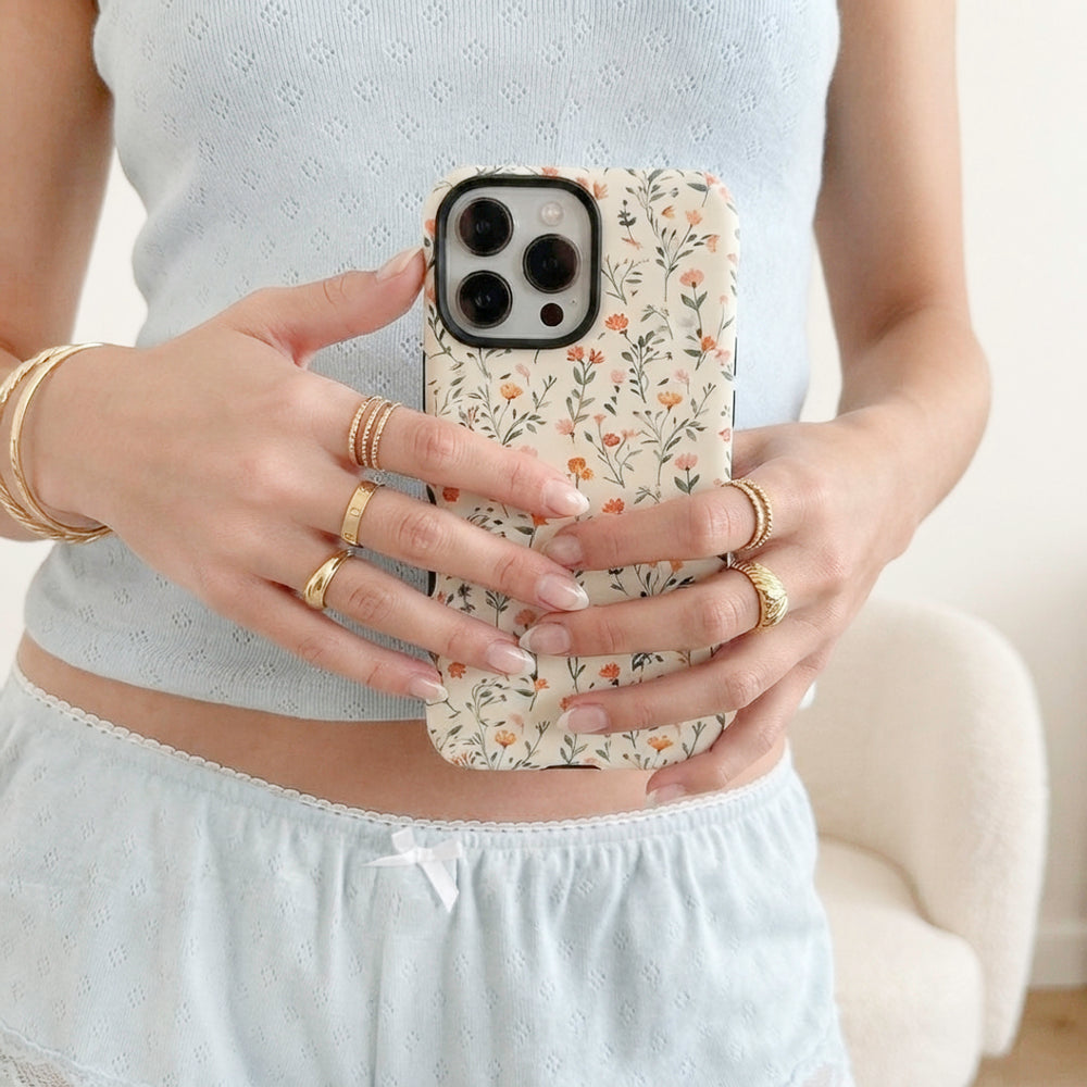 iPhone case with small pastel flowers