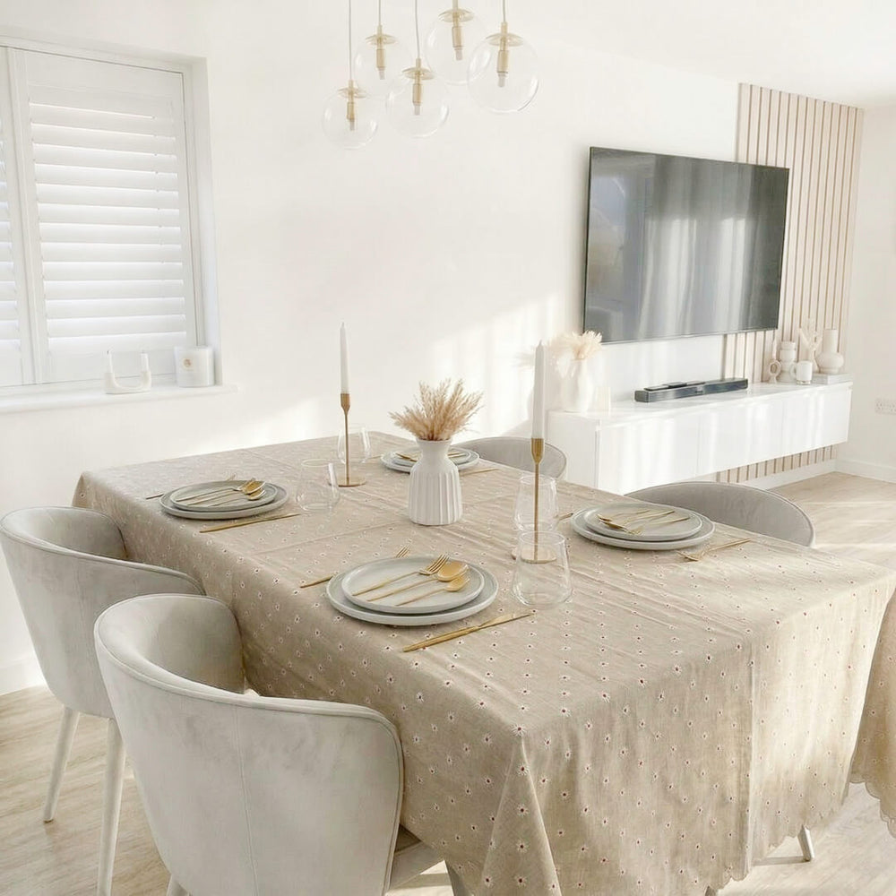 tablecloth with delicate daisy embroidery and neutral tones