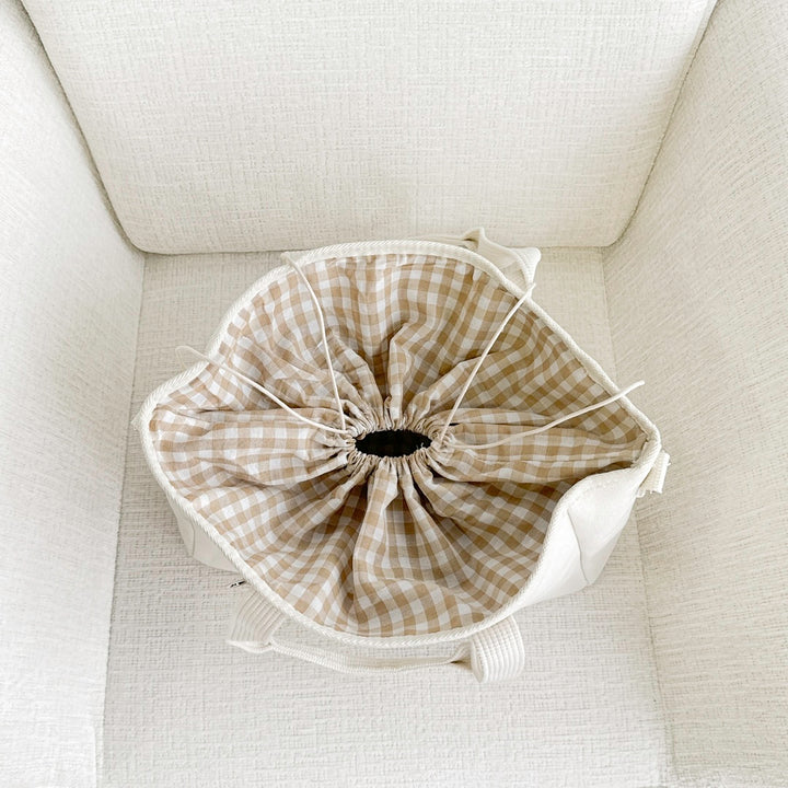 Multifunctional diaper bag with drawstring and handles