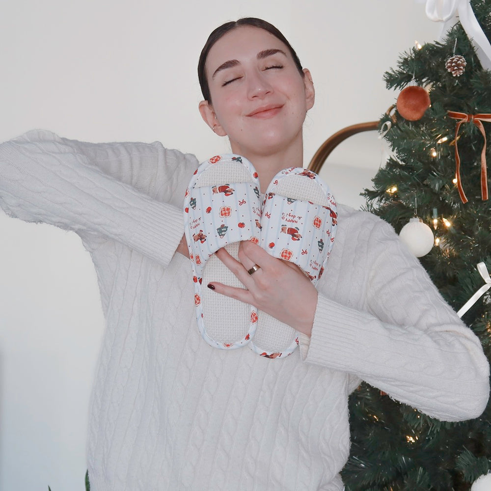 Christmas slippers featuring adorable dog pattern and winter motifs