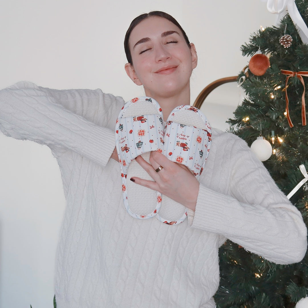 Christmas slippers featuring adorable dog pattern and winter motifs