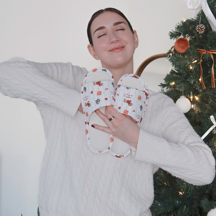 Christmas slippers featuring adorable dog pattern and winter motifs