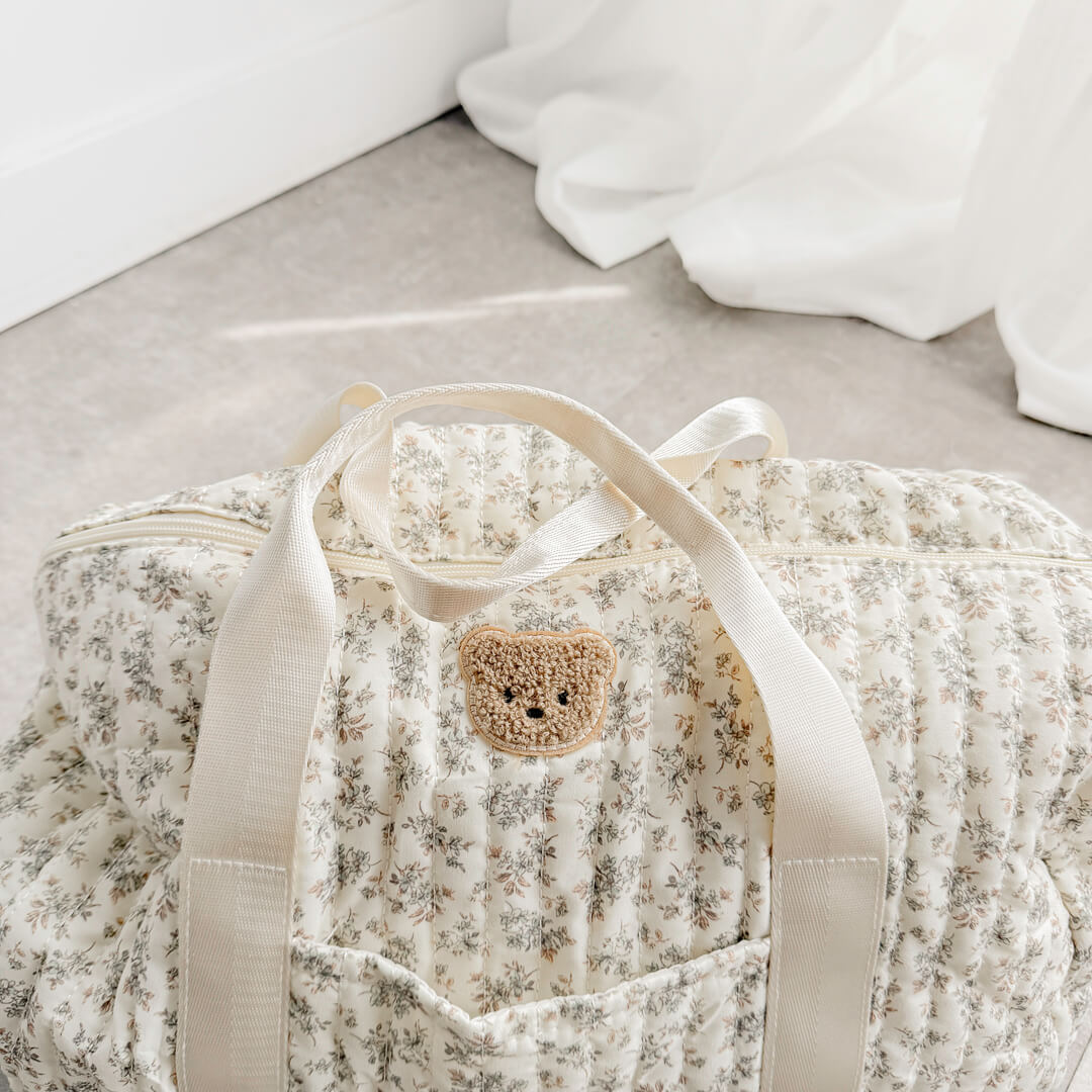 Soft floral duffle bag with top handles