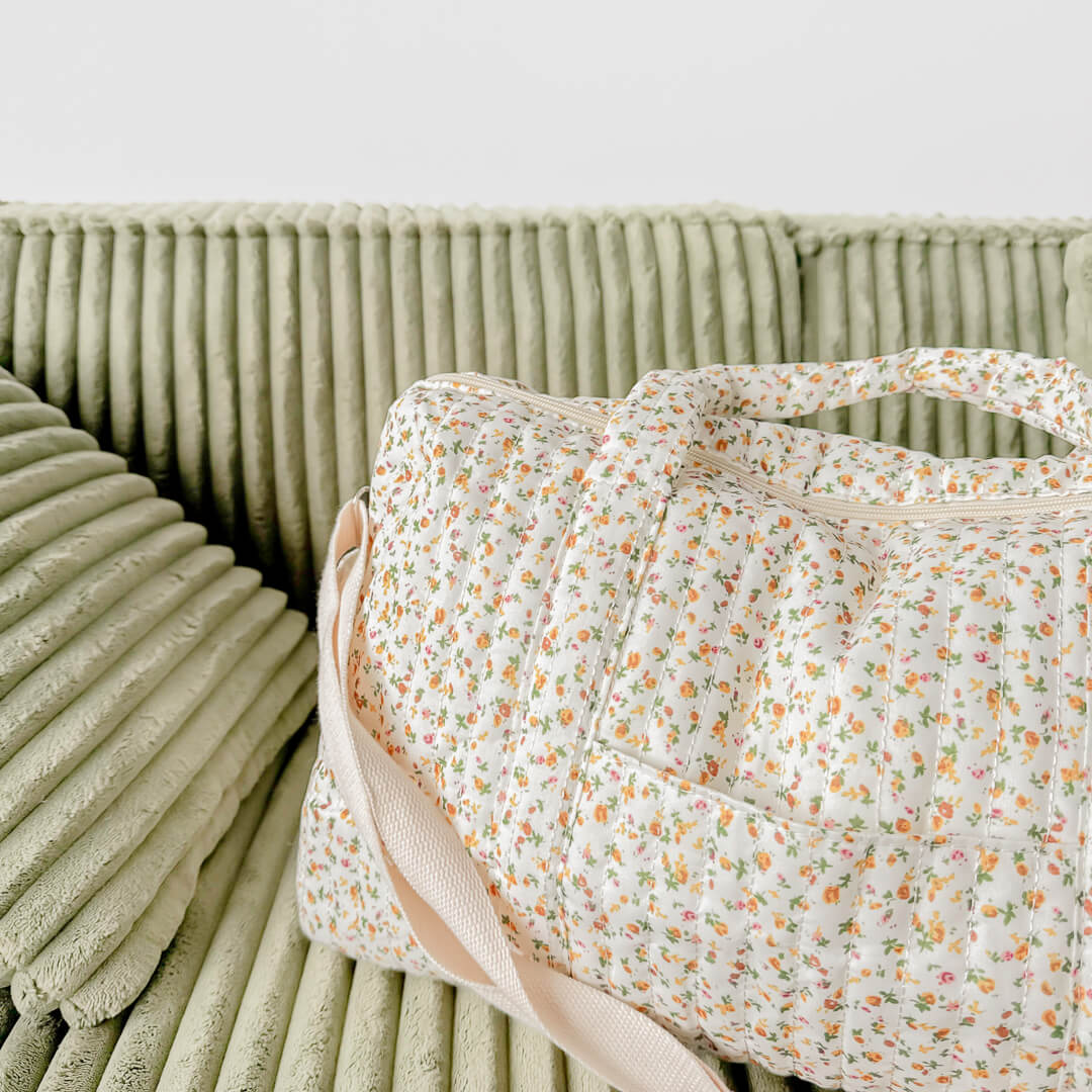 Padded floral duffle bag for travel essentials