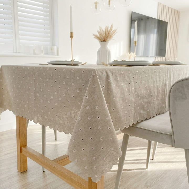 tablecloth with small daisy embroidery and elegant scalloped hem