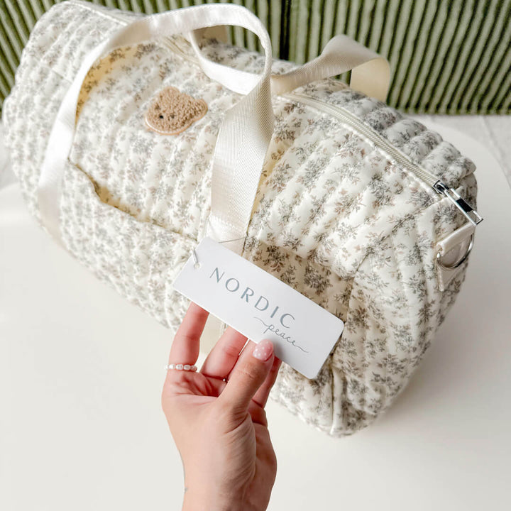 floral duffle bag with padded quilted finish