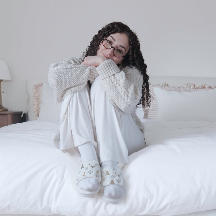 white holiday slippers with metallic gold Christmas pattern