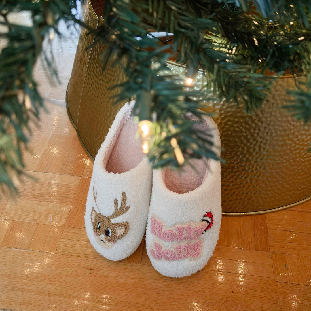 Cozy indoor slippers with Holly Jolly theme and winter holiday style