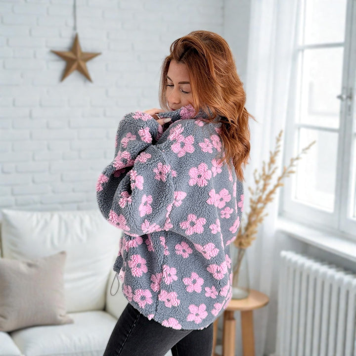 pullover sweater with pink flowers and relaxed fit