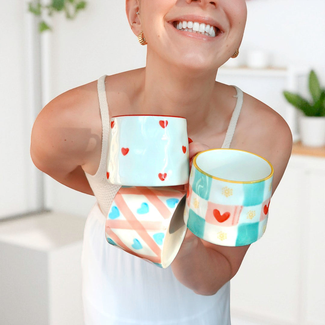 Modern ceramic coffee mug with heart details