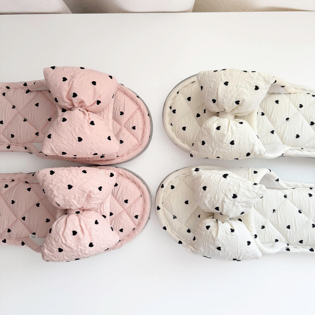 Soft home slippers with oversized bow and heart pattern