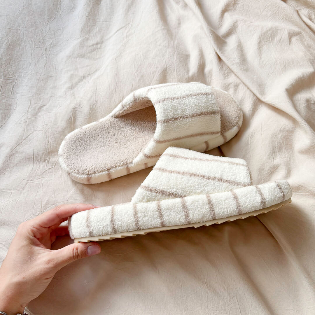 Cushioned open-toe house slippers with plush striped upper band