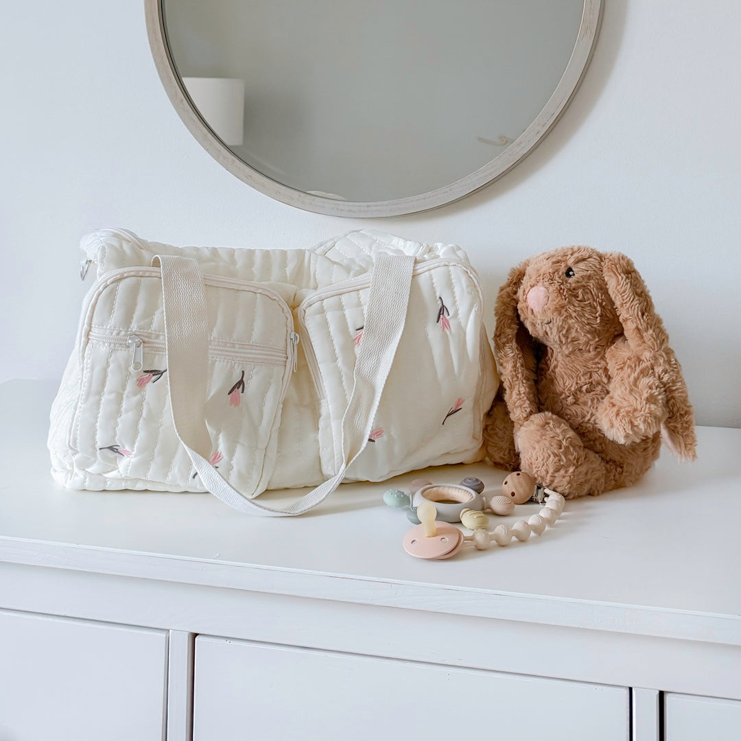 baby diaper bag with storage pockets