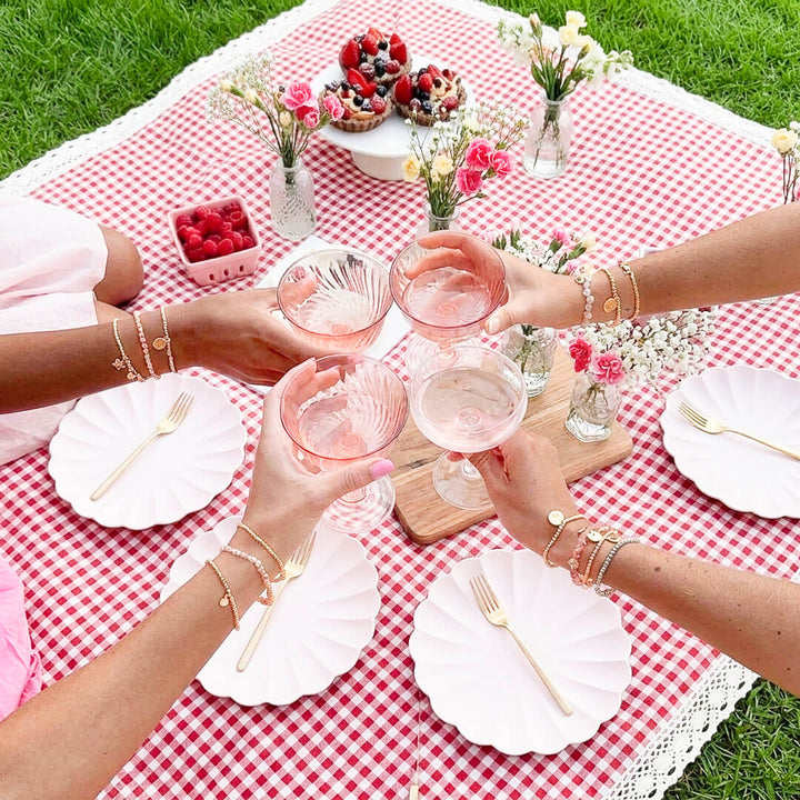 red and white gingham picnic blanket with scalloped lace trim