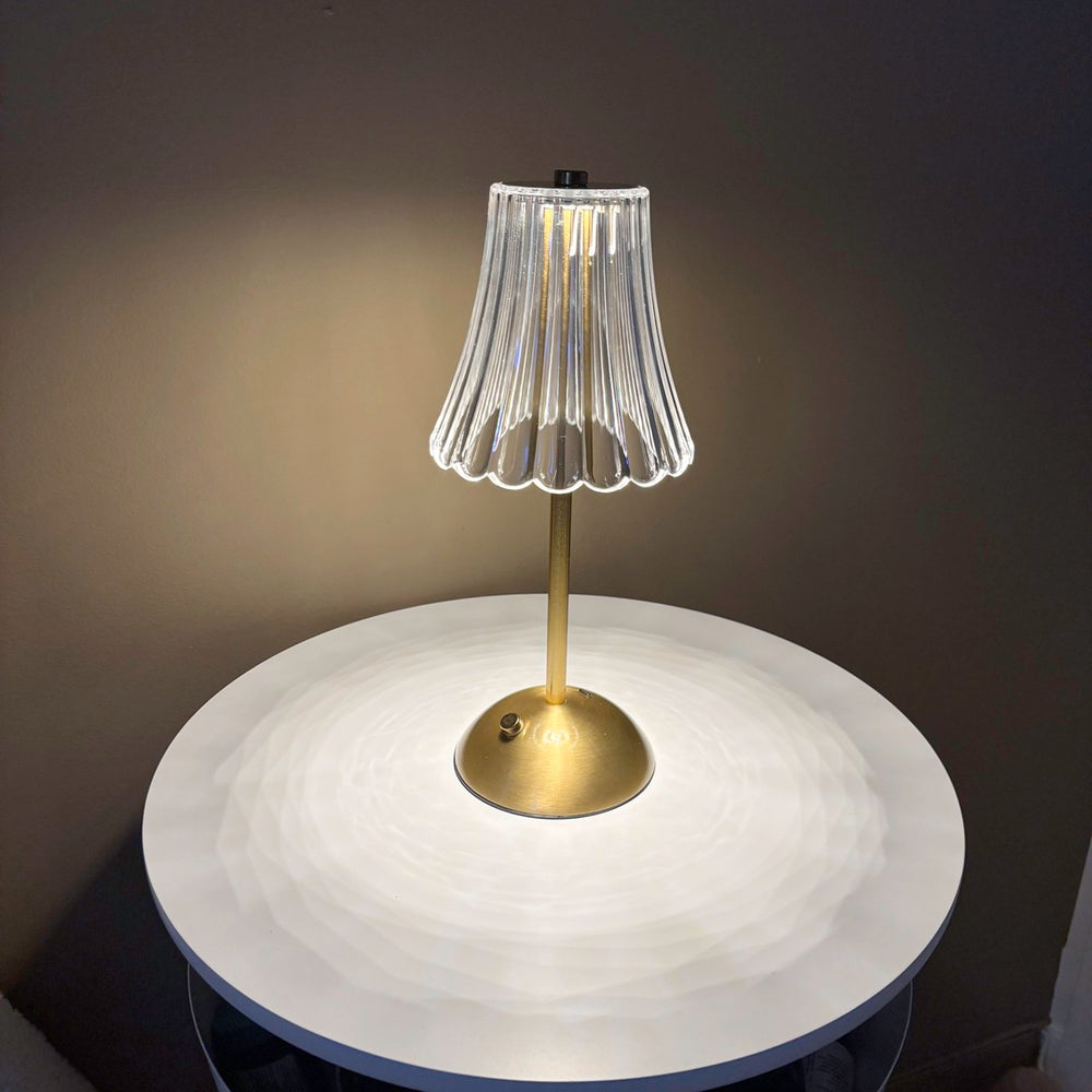 Elegant glass bedside lamp with warm ambient light