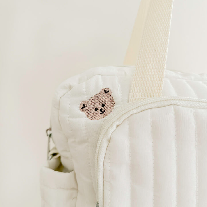 nursery diaper bag with padded quilted texture