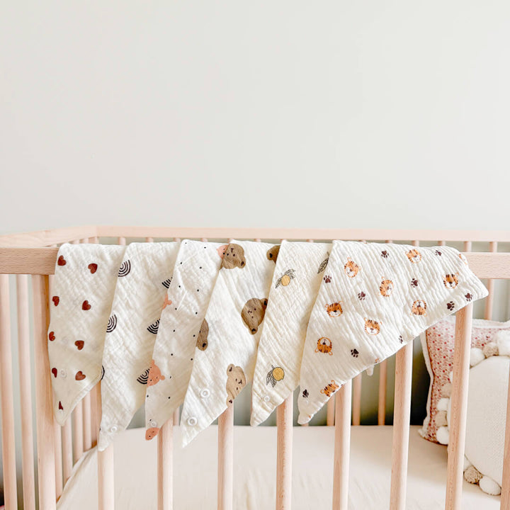 6 piece muslin baby bib set with snap closure