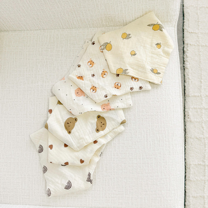 6 piece muslin baby bib set with snap closure