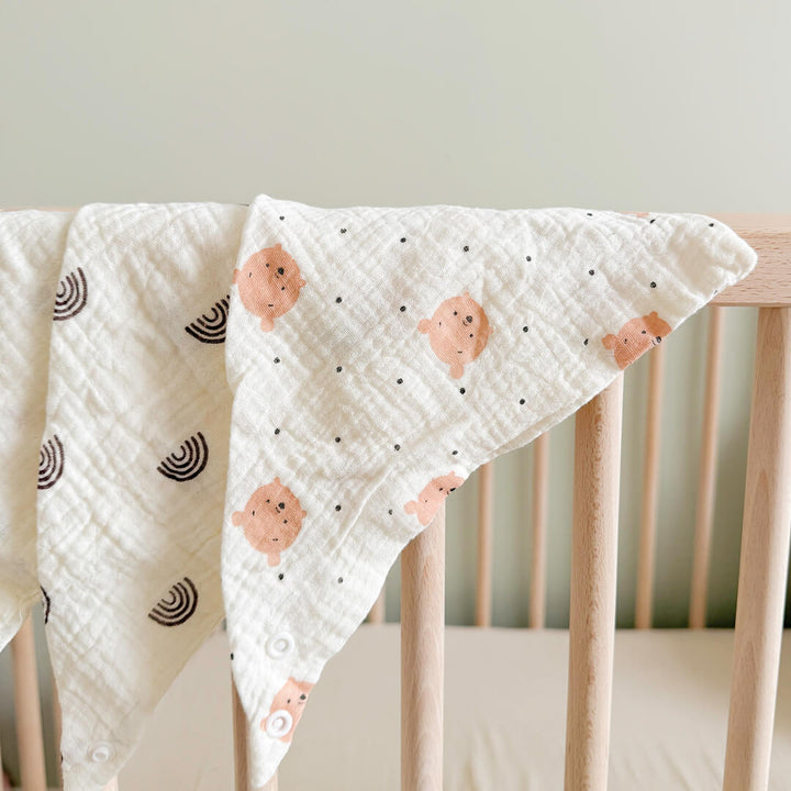 Muslin baby bib pack with neutral nursery colors