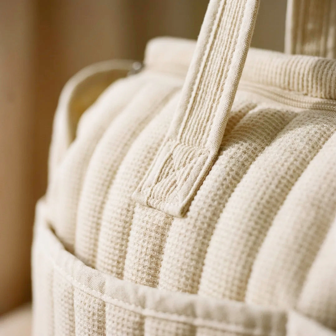 Beige baby diaper bag for newborn essentials