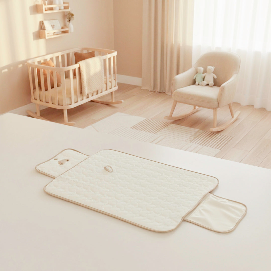 Newborn diaper changing pad folded for easy storage