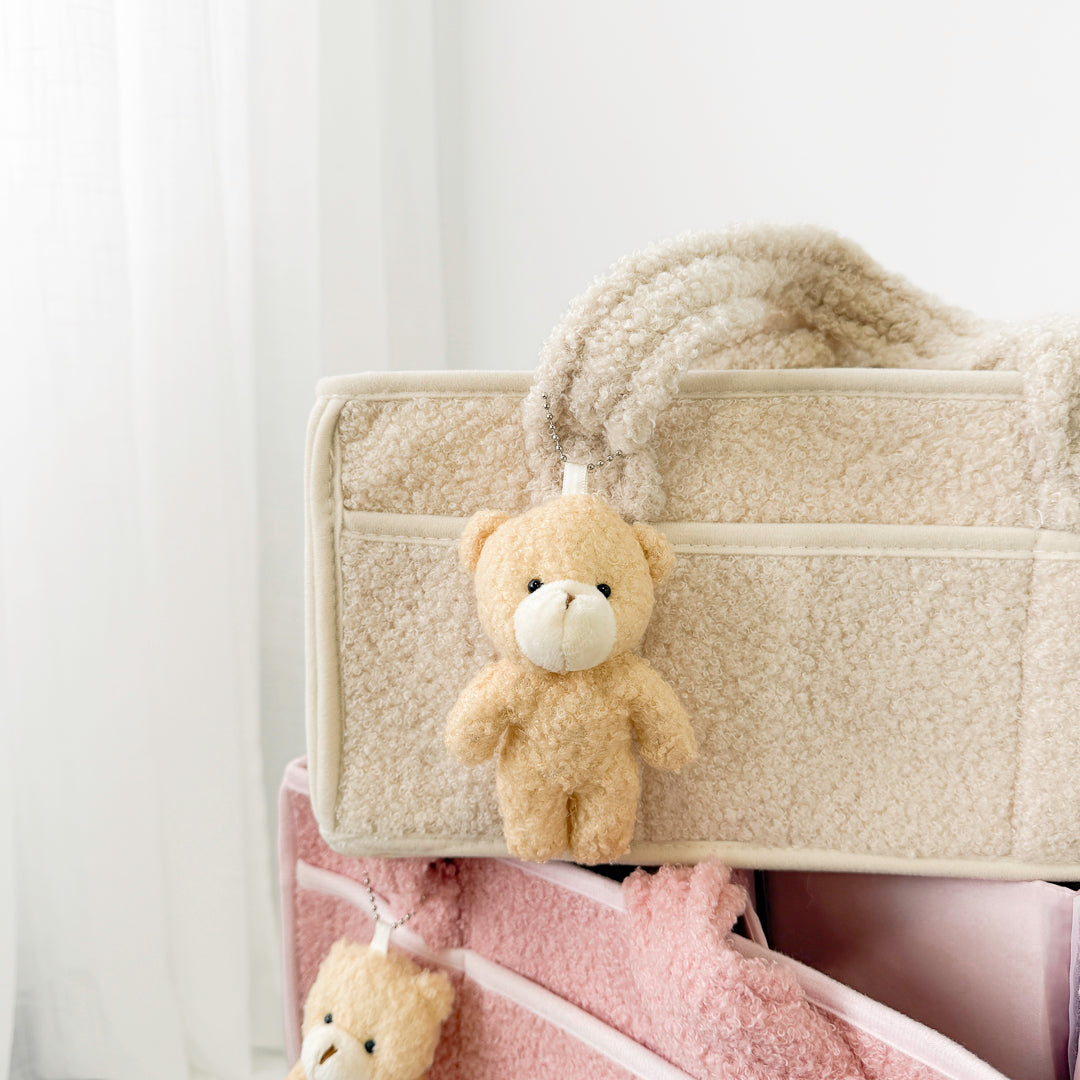 Soft fleece diaper organizer with divided sections for baby items