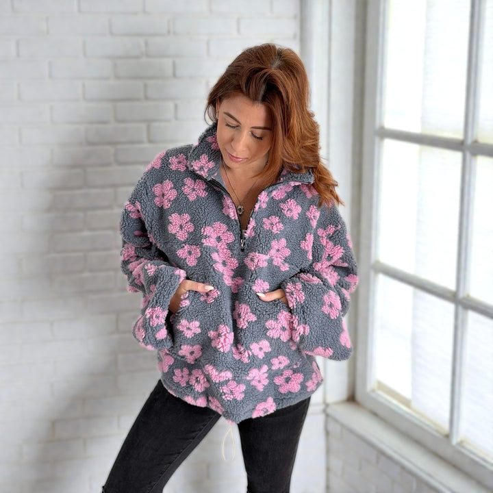 Oversized half zip sweater with pink floral pattern